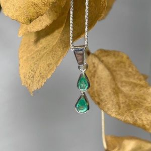 silver pendant with natural Colombian emeralds